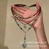 Collar de moda bohemia turquesa transfronterizo europeo y americano, accesorio de nicho de alta gama para mujer, juego de 2 gargantillas en capas