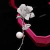 Alta moda pérola pino de cobre conjunto zircão Camellia masculino e feminino terno jaqueta acessórios rosa broche mulheres