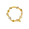 Pulsera elástica de cristal de imitación de lujo ligero de alta gama, versátil, con dijes de moneda irregulares, color dorado duradero que no se decolora