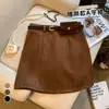 Mini falda de ante peluche ajustada a la cadera para mujer, otoño e invierno, versátil, de cintura alta, adelgazante, anti-exposición, línea A, para chica popular A14897