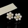 Pendientes de Flor de Perla de Zircón Aguja de Plata Diseño de Nicho Pendientes Elegantes Retro Lujo Ligero Pendientes de Gama Alta Venta al por Mayor para Mujeres