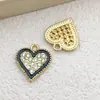 Conjunto Misto de 30 Pingentes Alados de Coração Vazado Bicolor Preto e Branco em Liga de Esmalte Acessórios para Joias DIY