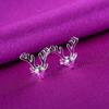 Pendientes boutique de estilo coreano, venta al por mayor de fábrica, pendientes de astas pequeñas de plata lisa para mujer, pendientes de reno navideño tridimensionales de lujo