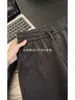 Pantalones Casuales de Rayas Verticales para Hombre Primavera/Otoño 2026 Cintura Elástica con Cordón Caída Alta Pierna Recta Ancha Moda Versátil