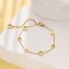 Pulseira clássica europeia e americana de flor da sorte em aço inoxidável para mulheres, alta retenção de cor, simples, oca, trevo de quatro folhas, pulseira de titânio
