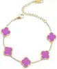 Pulsera de acero de titanio chapada en oro de 18k, de cuatro hojas, lisa, de moda, de venta caliente, con nácar de doble cara, fábrica de joyería de alta gama para mujer
