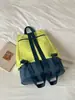 Mochila esportiva estilo coreano, corte relaxed, com blocos de cor, uma opção versátil e casual para casais, perfeita para atividades ao ar livre, trilhas e acampamento; uma mochila leve