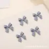 Jóias de unha de arco explosivo resina tridimensional pequeno arco diy decoração de unhas acessórios Joker atacado