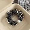 Lazo para el pelo de encaje y perlas de alto valor 2026 Nuevo estilo Cuerda de lazo para el pelo de lunares de alta gama Banda elástica Accesorios para el pelo