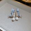 Pendientes de plata con forma de corazón, flor, perla y aguja francesa de lujo, con diseño de luz, estilo Joker, de nicho, avanzados, al por mayor para mujer.