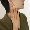 Industria Pesada para Crear Accesorios Transfronterizos de Estilo Francés Neutro Caliente Personalidad Retro Abanico Aretes Repujados Aretes de Acero Inoxidable