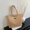Bolsa de pana casual simple versátil nueva de primavera para mujer, gran capacidad, bolso de mano para estudiante, bolso de axila, bolso de hombro