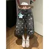 Jeans cortos estampados Chao Li Youhuo para mujer, verano, negros, retro, con bordado de dibujos animados, de cintura alta, elegantes, de longitud media