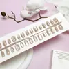 Venta al por mayor de puntas para decoración de uñas, pegatinas de uñas dulces y elegantes que realzan el cutis, set de 30 piezas con tiras codificadas, uñas personalizadas para usar