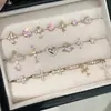 Pendientes de acero de titanio 316L en la colección café dorado claro, ear cuffs minimalistas de circonita, pendientes de alta gama personalizados con forma de corazón para mujer, lujo ligero