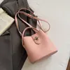 Bolso Cubo con Textura de Lichi de Comercio Exterior 2026 Nuevo de Nicho Casual para Hombro y Axila Bolso Cruzado de Moda