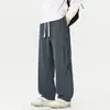 Pantalones de chándal anchos para hombre Enbu Otoño Nuevo Deportivos Sueltos Pierna Recta Estilo Coreano Modernos Casual Versátiles Pantalones Largos de Guadaña