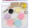Menina Macaron Coração Almofada de Ar Pente Pequeno Portátil Espelho de Maquiagem Feminino Pente Peça Única Pequeno Dobrável Pente de Massagem