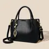 Bolso de mano para mujer 2026 nueva moda simple para mamá de mediana edad bolsa de gran capacidad multi-compartimento cuero suave bolsa para el día a día