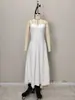 Moda Femenina Europea y Americana Nueva Primavera/Verano 2026 Vestido Elegante de Color Sólido con Cintura Entallada Hueso de Pez Ajustado con Tirantes para Mujer