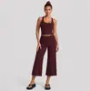 Conjunto de fitness transfronterizo con top de tirantes anchos para yoga, conjunto de pantalones capri de running para fitness que absorben la humedad y se secan rápidamente