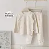 Conjunto de Pijama Infantil Estampa Total Coelho de Pão 2026 Outono/Inverno Lã Stretch Gola Redonda Blusa e Calça Pijama de Outono para Meninas