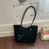 Bolso grande de mano vintage transfronterizo para mujer, nuevo modelo otoño 2026, bolso de hombro simple, bolso tote de moda casual para el día a día