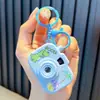 Llavero de Cámara de Proyección de Muñeca de Dibujos Animados Luminoso Proyector Artificial Llavero Colgante para Bolso Regalo Pequeño