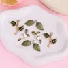 Colar com pingente de folha verde estilo floresta acessório DIY joia artesanal em liga com gota de óleo acessório corrente de celular chaveiro pingente