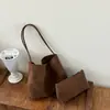 Bolso de mujer Shuai Mi Jia de gran capacidad 2026 otoño nuevo bolso de hombro de moda color liso texturizado popular bolso tote para el día a día