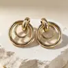 Brincos Geométricos de Metal Retrô Europeus e Americanos Brincos de Pino Redondos de Camada Dupla de Alta Qualidade Exagerados Ornamentos de Orelha Estilo Frio Ornamentos de Orelha Redondos