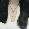 Plata de Ley S925 Tienda de Oro Mismo Estilo Collar Buda Maitreya Colgante Pequeño de Buda de Oro para Niña Cuerda Tejida Buda Sonriente Nuevo Estilo Chino