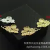 Acessórios para grampo de cabelo passo cor-preservação ouro e prata cobre fundido Xiangyun pingente pingente lado esquerdo e direito adesivos internos 10MM