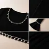 Vestido tejido con adornos de perlas negras, manga larga, cuello cuadrado, corte ajustado corto, estilo europeo y americano, ropa de mujer transfronteriza