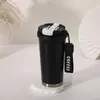 Venda Direta da Fábrica Copo Térmico a Vácuo de Aço Inoxidável, Copo Portátil para Uso Externo com Alça de Transporte, Caneca de Café de Alto Valor Estético para Uso Duplo