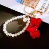 Cadena de Perlas de Camelia Llavero para Coche Colgante para Bolso de Mujer Llavero Flor de Tela Linda Borla Regalo