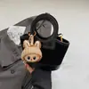 Bolso cubeta de estilo coreano, nicho, retro, bloques de color patchwork, un bolso de mano moderno y versátil que se puede llevar en la mano, como bolso de hombro o cruzado.; una bolsa pequeña tipo cesta