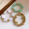 Pulsera elástica de acrílico geométrico irregular vintage nueva con un diseño de nicho, joyería de moda trendy para mujer