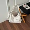 Bolsa Tote de Ombro Único Casual de Grande Capacidade Transfronteiriça Feminina Outono 2026 Nova Alta Aparência Mochila Transversal para o Trabalho