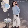 Conjunto Novo de Meninas para Primavera/Outono 2026 Manga Longa Design Versátil Zíper na Blusa Combinado com Calça Wide Leg Tendência