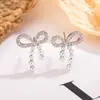 Brincos de Pérola em Laço para Mulheres 2025 Novos Populares Nicho Versátil High-End Brincos Estilo Elegante Cool