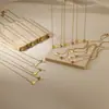 Collar Transfronterizo Nuevo de Acero Inoxidable con Doce Piedras de Nacimiento ins12 Piedra de Nacimiento Colgante de Corazón Perforado con Flecha Dorada de 18K