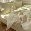 2026 Nuevo Modelo Clase A Estilo Francés Fresco Encaje Arrugado Algodón Lavado Juego de Cama de Cuatro Piezas Sábana de Dormitorio