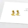 Acero de Titanio Moda Femenina Elegantes Modernos Pendientes de Corazón Nicho Gama Alta Estrella Trébol Tornillo Pendientes de Botón