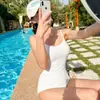 Traje de baño de una pieza de color liso para mujer, estilo verano 2024, con tirantes en la espalda y tirantes cruzados, Bikini sexy para chica sexy