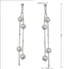 Pendientes Coreanos Dongdaemun con Borla de Perlas Moda Pendientes de Botón de Lujo Ligero para Mujeres Temperamento Nicho Pendientes Largos para Socialités