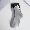 Calcetines degatito para mujer, calcetines de media pantorrilla para otoño e invierno, calcetines cálidos de felpa de dibujos animados lindos estilo coreano sin costuras holgados para mujer, venta al por mayor