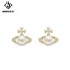 Pendientes Exquisitamente Diseñados de Perla Planeta Saturno para Mujer, Lujo Ligero, Nicho, Gama Alta, Modernos, Versátiles