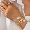 Pulsera y Anillo Abiertos de Lujo Dorados con Perlas, Set de Moda Transfronterizo Europeo y Americano de Venta Caliente para Mujer, Apilable, Set de Moda de Alta Gama y Personalidad