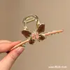 Pinzas para el cabello de alta gama para mujer para la parte posterior de la cabeza, exquisitas pinzas de garra de perla para el día a día, elegantes pinzas de tiburón para salir, venta al por mayor de artículos pequeños de Yiwu
